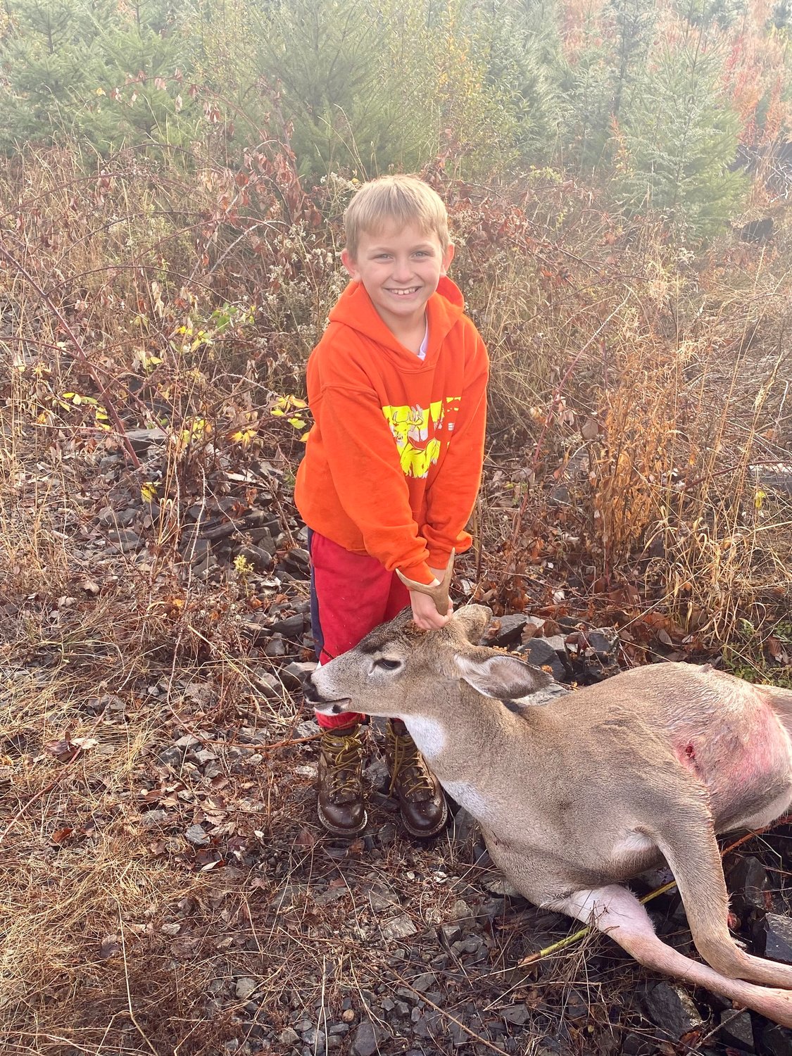 "Our son Easton Rivera, age 9. First year hunting and filled his tag, harvested from the St. Helens Tree Farm." — Submitted by Mikayla Ellis